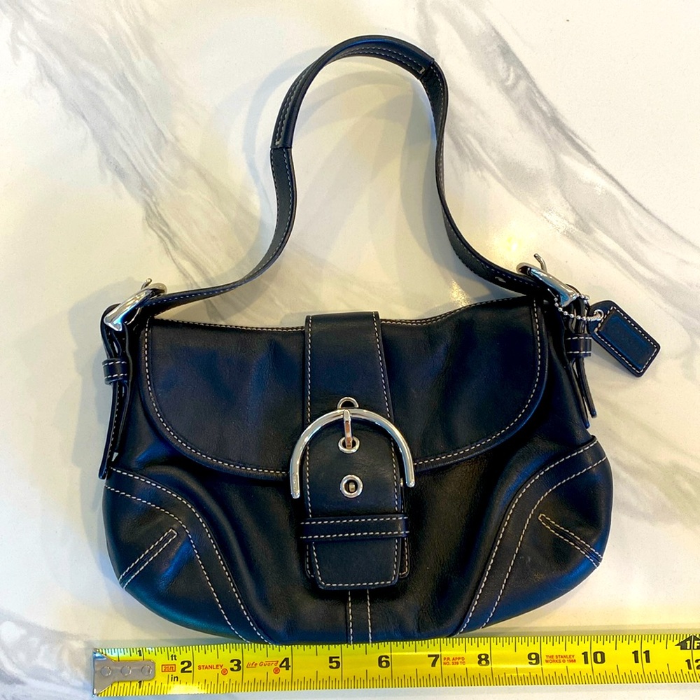 Like new Coach shoulder bag. Black leather and silver hardware